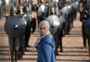 This file publicity image released by HBO shows Emilia Clarke as Daenerys Targaryen in a scene from "Game of Thrones." HBO plans to offer a stand-alone version of its popular video-streaming service, CEO Richard Plepler said at an investor meeting at parent Time Warner Inc. on Wednesday, Oct. 15, 2014. (AP Photo/HBO, Keith Bernstein, File)