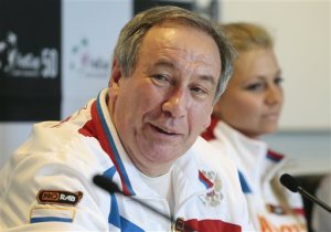 FILE - In this April 16, 2013 file photo, Russia's team captain Shamil Tarpischev speaks during a news conference prior to the Fed Cup match between Russia and Slovakia in Moscow, Russia. Russian Tennis Federation President Tarpischev has been fined $25,000 by the WTA Tour and suspended from tour involvement for a year for questioning Venus and Serena Williams' gender in comments on Russian television. The WTA Tour said Friday, Oct. 17, 2014, that the $25,000 fine is the maximum allowed under tour rules and that it is seeking Tarpischev's removal as chairman of the Kremlin Cup tournament for one year. (AP Photo/Mikhail Metzel, File)