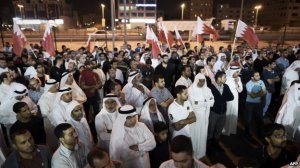 Supporters of the opposition al-Wefaq movement gather before the poll