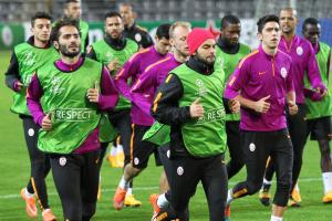  Hamit Altintop (L) and Selcuk Inan (C) of Galatasaray are seen during a training session at the Signal Iduna Park Stadium ahead of the UEFA Champions League Group D fourth match with Borussia Dortmund, in Dortmund, Germany, on November 3, 2014.