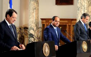  Prime Minister of Greece, Antonis Samaras (R), Egyptian President Abdel Fattah el-Sisi (C) and Greek leader Nikos Anastasiadis (L) attend a press conference in Cairo, Egypt on November 8, 2014.