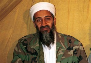 FILE - This undated file photo shows al Qaida leader Osama bin Laden in Afghanistan. After U.S. Navy SEALs killed Osama bin laden in Pakistan in May 2011, top CIA officials secretly told lawmakers that information gleaned from brutal interrogations played a key role in what was one of the spy agencys greatest successes. CIA director Leon Panetta repeated that assertion in public, and it found its way into a critically acclaimed movie about the operation, Zero Dark Thirty, which depicts a detainee offering up the identity of bin Ladens courier, Abu Ahmad al- Kuwaiti, after being tortured at a CIA black site. As it turned out, Bin Laden was living in al Kuwaitis walled family compound, so tracking the courier was the key to finding the al-Qaida leader.  