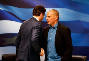  File-Jeroen Dijsselbloem, (left) head of the euro zone finance ministers' group, and Greek Finance Minister Yanis Varoufakis shake hands after a press conference in Athens January 30, 2015 