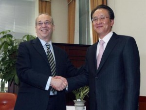 U.S. Assistant Secretary of State for East Asian and Pacific Affairs Daniel Russel shakes hands with his South Korean counterpart Lee Kyung-soo during their meeting in Seoul 