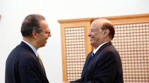 Yemen's President Abdrabuh Mansur Hadi (R) meets UN envoy to Yemen Jamal Benomar in Aden on February 26, 2015