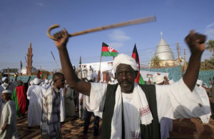 Supporters of former prime minister (1986-1989) and now head of the National Umma Party (NUP), religious leader Sadiq al-Mahdi, rally in Khalifa Square in Sudan’s twin capital of Omdurman