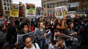 A group of demonstrator gather to support a hundreds of people who protest against police violence, at Union Square in New York, on April 14, 2015.