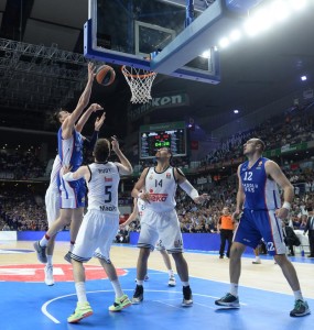  Anadolu Efes Istanbul's Saric vies with Real Madrid's Rudy (5) during the Turkish Airlines Euroleague playoff basketball match Real Madrid vs Anadolu Efes Istanbul at the Barclaycard Center in Madrid on April 15, 2015.