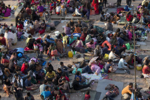People gather on an open space for security reasons at Basantapur Durbar Square, damaged in Saturdays earthquake, in Kathmandu, Nepal, Sunday, April 26, 2015. The earthquake centered outside Kathmandu, the capital, was the worst to hit the South Asian nation in over 80 years. It destroyed swaths of the oldest neighborhoods of Kathmandu, and was strong enough to be felt all across parts of India, Bangladesh, China's region of Tibet and Pakistan.