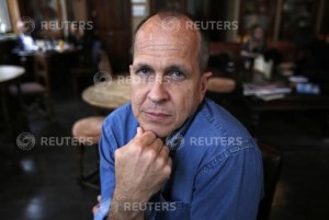 Australian broadcast journalist, Peter Greste, recently freed from prison in Egypt, poses for a portrait before giving a press conference at the Frontline club, London, February 19, 2015. 