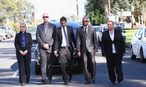 Chintu Sukamaran (3rd left), in front of the hearse carrying his brother Myuran’s coffin
