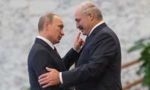 Belarus' President Alexander Lukashenko, right, greets his Russian counterpart Vladimir Putin during the Commonwealth of Independent States (CIS) leaders summit in Minsk, Belarus, Friday, Oct. 10, 2014. 