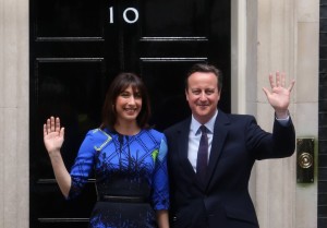 David Cameron and his wife Samantha Cameron arrive at Downing Street on May 8, 2015