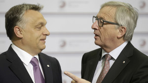 European Commission President Jean-Claude Juncker (R) speaks to Hungary's Prime Minister Viktor Orban before the Eastern Partnership Summit session in Riga, Latvia, May 22, 2015