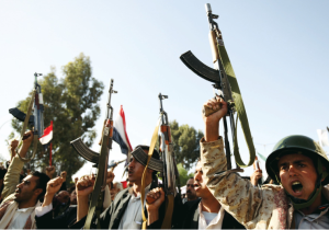 Houthi fighters raise their weapons as they demonstrate against an arms embargo imposed by the UN Security Council on the group, in Yemen’s capital of Sanaa last week.
