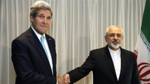 File-Iranian Foreign Minister Mohammad Javad Zarif (R) shakes hands with US State Secretary John Kerry in Geneva on January 14, 2015