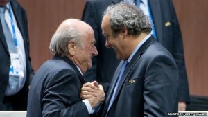 Michel Platini (right) congratulated Sepp Blatter, despite telling him to resign days earlier