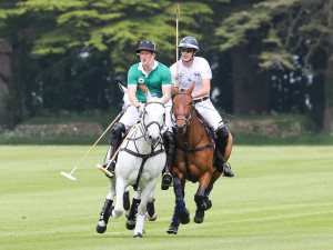 Prince Harry (left) playing polo
