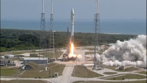 An Atlas V rocket lifts off with the X-37 spaceplane and Lightsail satellite