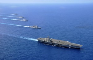 The aircraft carrier USS Nimitz (CVN 68), the guided-missile cruiser USS Chosin (CG 65), the guided-missile destroyers USS Sampson (DDG 102) and USS Pinkney (DDG 91), and the guided-missile frigate USS Rentz (FFG 46) operate in formation in the South China Sea. 