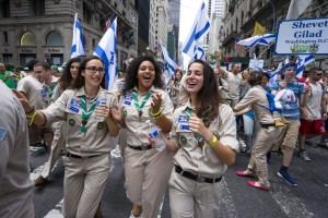 A delegation of Israel Scouts march along Fifth Ave. during the Celebrate Israel Parade, Sunday, May 31, 2015, in New York