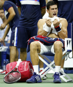 Novak Djokovic, of Serbia, reacts after losing the second set to Feliciano Lopez, of Spain, during a quarterfinal round of the U.S. Open tennis tournament in New York. 
