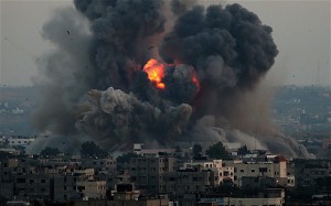 Smoke rises after an attack of Israeli aircraft in the South of Gaza City