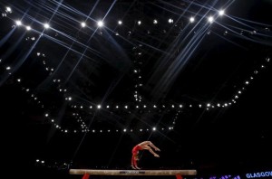 Alexandra Raisman of the U.S. performs on the beam during the women's team final at the World Gymnastics Championships at the Hydro arena in Glasgow, Scotland, October 27, 2015. 