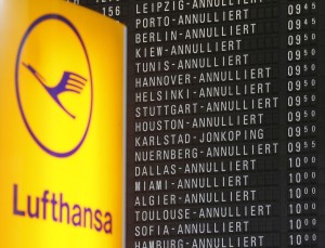 Cancelled flights appear on a board in a terminal of the airport as flight attendants of Lufthansa airline went on strike for the fourth day in Frankfurt, Germany, Monday, Nov. 9, 2015