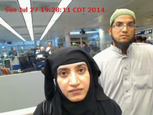 uly 27, 2014, photo provided by U.S. Customs and Border Protection shows Tashfeen Malik, left, and Syed Farook, as they passed through O'Hare International Airport in Chicago