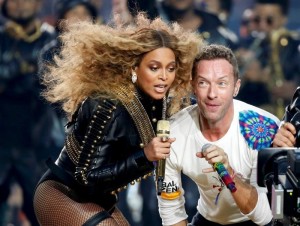 Beyonce and Chris Martin of Coldplay perform during the half-time show at the NFL's Super Bowl 50 between the Carolina Panthers and the Denver Broncos in Santa Clara, California February 7, 2016. 