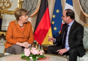 French President Francois Hollande (R) and German Chancellor Angela Merkel meet at the Prefecture in Strasbourg, France, February 7, 2016. 