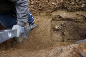 A member of the Association for the Recovery of Historical Memory (ARMH) takes part in the exhumation of the grave in Guadalajara's cemetery, Spain, January 27, 2016. 