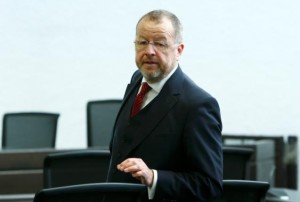 Ex-Chief Financial Officer of German luxury car company Porsche AG, Holger Haerter arrives for his trial at the court in Stuttgart, Germany March 18, 2016.  