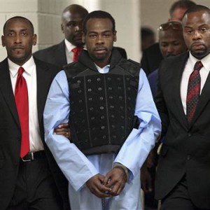 File-Rafael McCloud, 33, center, is escorted to a holding cell by Vicksburg, Miss., police investigators at the Vicksburg Police Department after his initial court appearance in the abduction and death of Sharen Wilson, 69, on July 1, 2015.