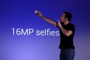 Xiaomi Vice President Hugo Barra demonstrates a selfie during the launching ceremony of Redmi Note 3 in Hong Kong, China March 21, 2016.      
