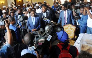 Equatorial Guinea incumbent president and candidate Teodoro Obiang Nguema (centre) speaks to the media at a polling station in Malabo on April 24, 2016.