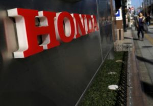 A logo of Honda Motor Co is seen outside the company's dealership in Tokyo