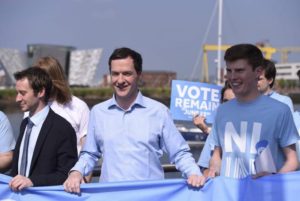 Britain's Chancellor of the Exchequer, George Osborne (C), poses for a photograph with local Remain in the EU campaigners, at an event organised by Stronger In, in Belfast, Northern Ireland June 5, 2016. 
