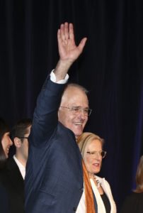 Prime Minister Malcolm Turnbull waves to supporters after he addressed a reception on election night in Sydney, Australia, Sunday, July 3, 2016. The result of the nation's election is too close to call in a race that could end with neither side able to form a majority government and may not be decided for several days.