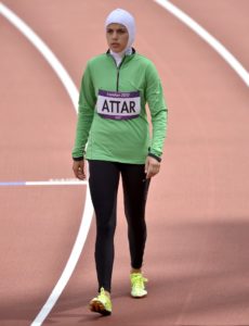  Saudi Arabia's Sarah Attar prepares to compete in a women's 800-meter heat during the athletics in the Olympic Stadium at the 2012 Summer Olympics, London. Aug. 8, 2012 file photo.