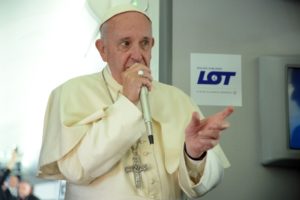Pope Francis answers reporters questions on board the flight from Krakow, Poland, to Rome, at the end of his 5-day trip to southern Poland, Sunday, July 31, 2016.