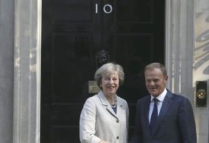 Britain's Prime Minister Theresa May (L) greets European Council President Donald Tusk in Downing Street in London, Britain September 8, 2016. 