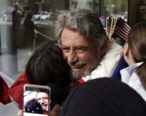 Defendant Neil Wampler is greeted by supporters as he leaves federal court in Portland, Ore., Thursday, Oct. 27, 2016. A jury exonerated brothers Ammon and Ryan Bundy and five others of conspiring to impede federal workers from their jobs at the Malheur National Wildlife Refuge.