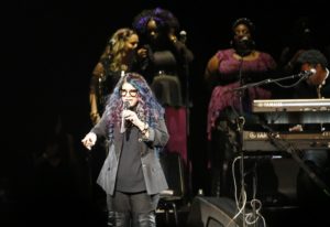 Tyka Nelson, Prince's sister, appears on stage during a tribute concert honoring the late musician at Xcel Arena, Thursday, Oct. 13, 2016, in St. Paul, Minn. Prince died in April of an accidental overdose.