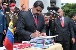Venezuela's President Nicolas Maduro (C) attends a ceremony to sign off the 2017 national budget at the National Pantheon in Caracas, Venezuela October 14, 2016. 