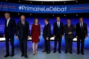 (From L-R) French politicians Bruno Le Maire, Alain Juppe, Nathalie Kosciusko-Morizet, Nicolas Sarkozy, Jean-Francois Cope, Jean-Frederic Poisson and Francois Fillon pose before the first prime-time televised debate for the French conservative presidential primary in La Plaine Saint-Denis, near Paris, France, October 13, 2016.