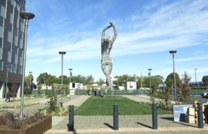 Wednesday Oct. 19, 2016, a 55-foot nude statue stands in San Leandro, Calif. The statue of a naked woman is stirring controversy and a lot of conversation. 