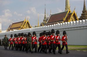 Thai Royal Guard march outside the Grand Palace Friday, Oct. 14, 2016 prior to a religious ceremony for the late King Bhumibol Adulyadej in Bangkok, Thailand. Bhumibol, the world's longest reigning monarch, died on Thursday at the age of 88. 