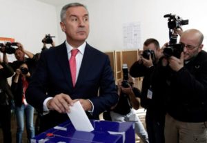 Montenegrin Prime Minister and leader of ruling Democratic Party of Socialists, Milo Djukanovic, casts his ballot at a polling station in Podgorica, Montenegro, October 16, 2016.